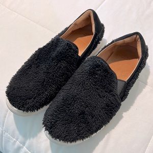 EUC UGG black fuzzy slip on sneakers, women’s size 11.